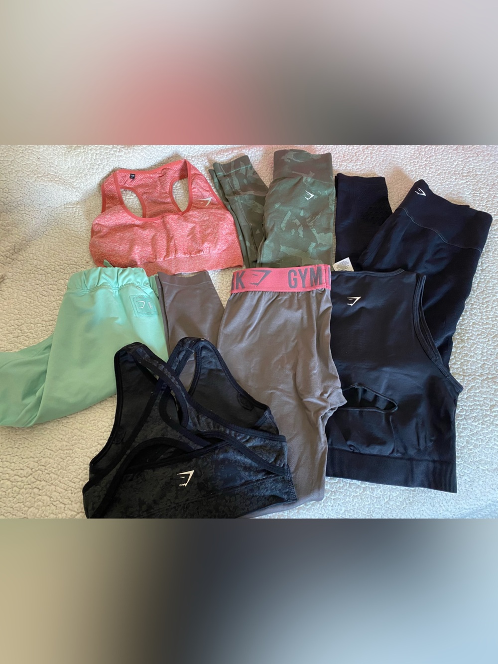 Gymshark grab bag with seven items. Different sizes. Some imperfections.